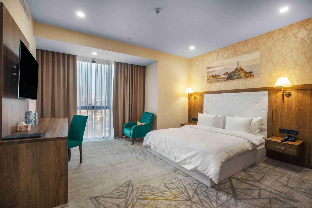 Royal Tulip Hotel & Casino, Tbiliszi Kültér fotó Deluxe room